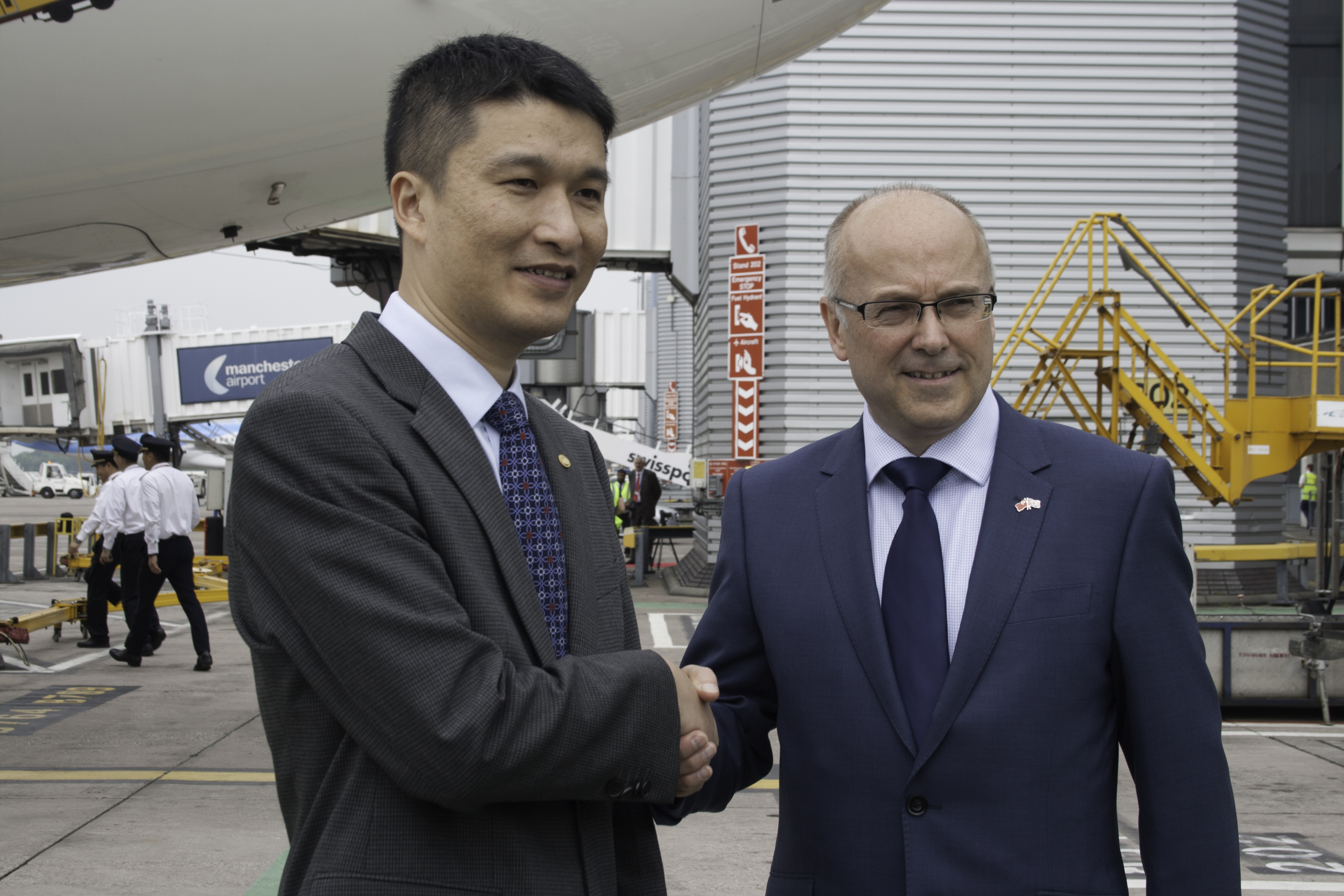 Picture of Hainan Airlines President Xie Haoming and Charlie Cornish, the CEO of MAG shaking hands and giving the aircraft the final send-off before departure! - Picture by James Field.