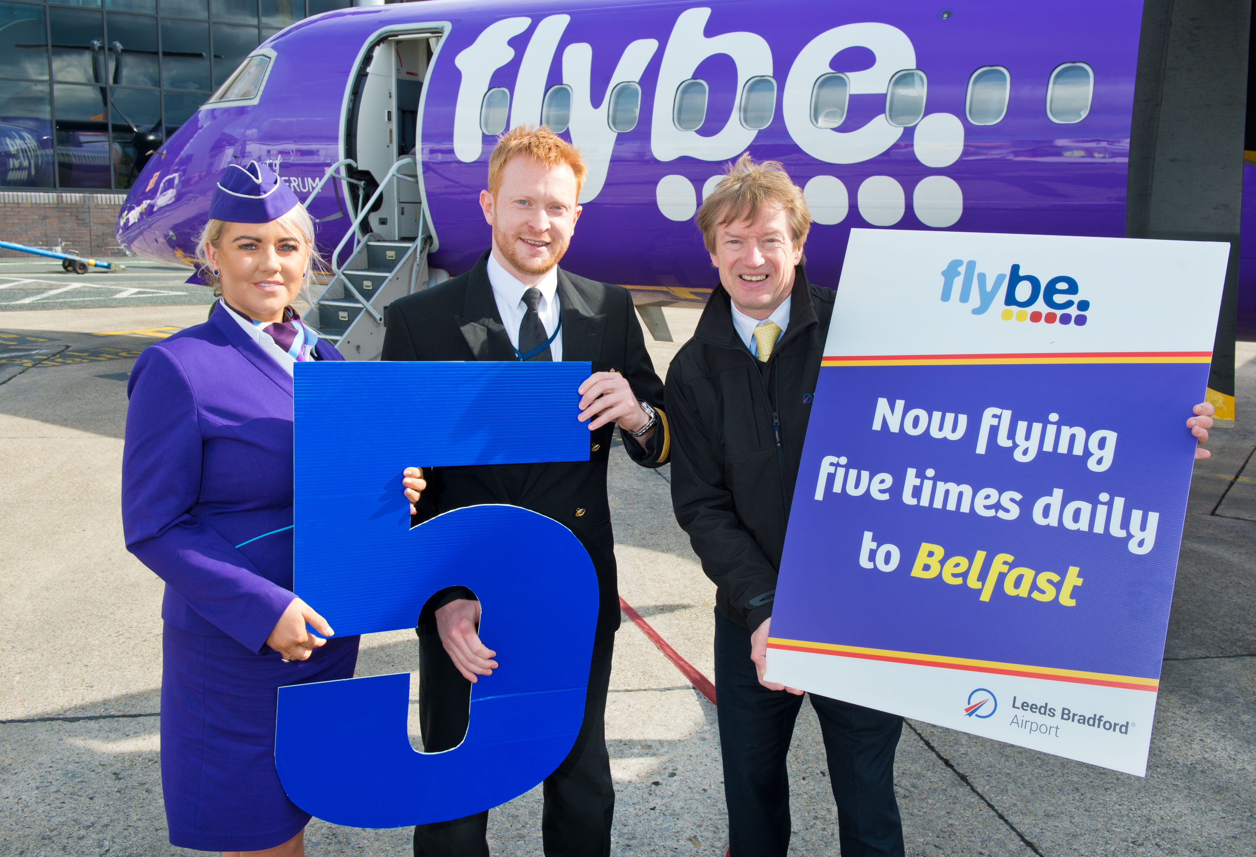 Image caption: Tony Hallwood, right, with Flybe’s crew to celebrate the fifth rotation from Leeds Bradford Airport – which starts today. Photograph by Richard Walker/ www.imagenorth.net