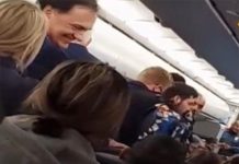 INCIDENT American Airlines #AA2300 was forced to make an emergency landing when a passenger tried to open an exit door